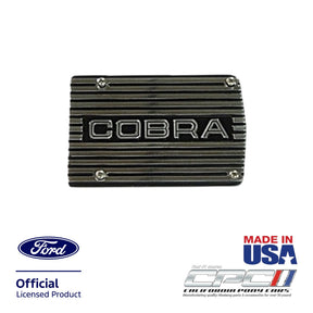 Front view of polished A/C compressor cover plate with Cobra lettering for Ford engines, Ford Official Licensed Product, Made in the USA, CPC part ENG-000-483.