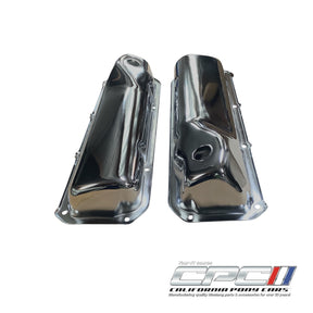 ENG-000-519 351 Cleveland chrome valve covers shown as a pair from above, featuring a polished finish, circular openings, and mounting flanges.